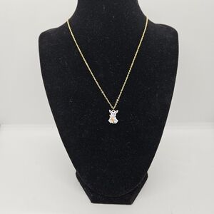 gold tone chain necklace with white bunny pendant